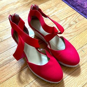 Red strappy shoes